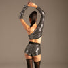 Glamour Glow Mini-Shorts Silber von KYNX: Rückansicht am Model: Mini-Shorts mit Top und Strümpfen