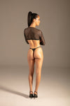 Matte PU Wetlook Verstellbarer String Schwarz von KYNX: String mit dünnen Seitenbändern, Ganzkörper Rückansicht