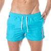 Badeshorts - Eleganter Mid-Thigh Schnitt mit schnelltrocknendem Stoff, Türkis | TOF Paris