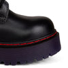 8-Loch Plateau-Stiefeletten aus schwarzem Leder mit violetter Sohle | Aderlass