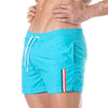 Badeshorts - Eleganter Mid-Thigh Schnitt mit schnelltrocknendem Stoff, Türkis | TOF Paris