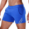 Blaues verführerisches Shorts Modell mit phosphoreszierenden Akzenten | TOF Paris